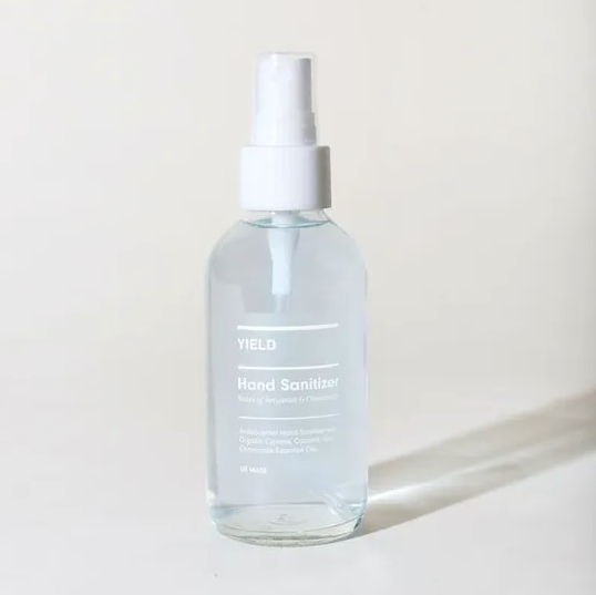 hydrating hand sanitizer in glass bottle